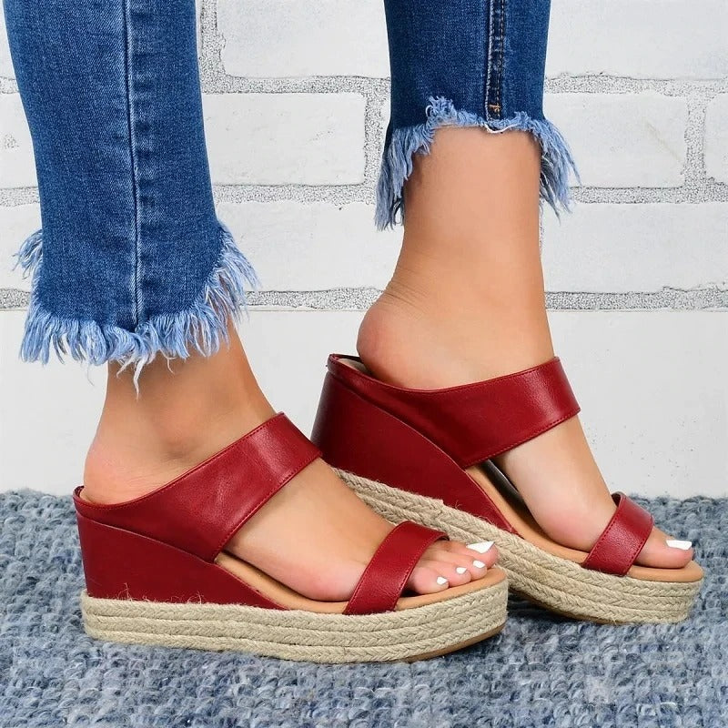 https://cdn.shopify.com/s/files/1/0665/8821/3361/files/sandales-a-talons-compenses-pour-femmes_main-0_1024x1024_cf245c18-4771-4c11-b5d6-89838ecdb3b4.jpg?v=1774149786